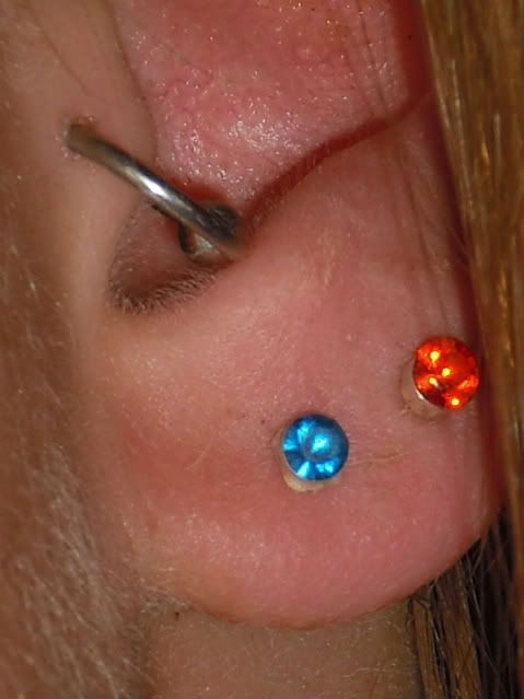  I could purchase some cute colorful studs for my lobe piercings.