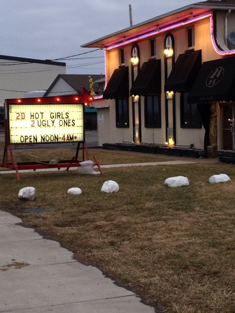 Funny sign in front of strip club. | Yellow Forums